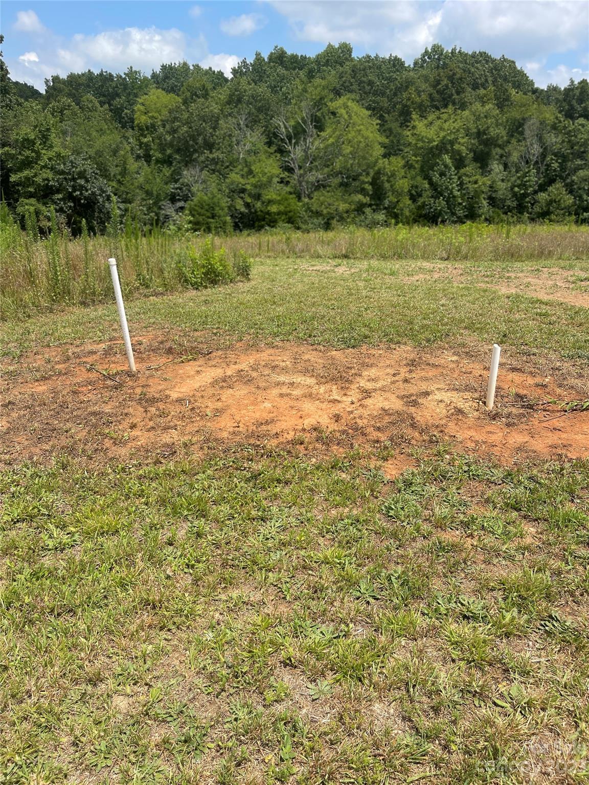 2301 Dutch Road Mount Pleasant, NC 28124 - Photo 10 of 14 a view of a field with a tree in the background