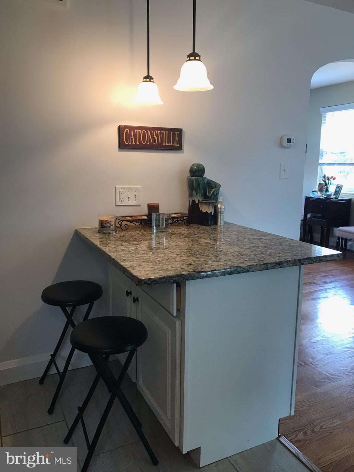 4 Tanglewood Road Baltimore, MD 21228 - Photo 14 of 35 BONUS ISLAND WITH GRANITE TOP & CUSTOM LIGHTING!
