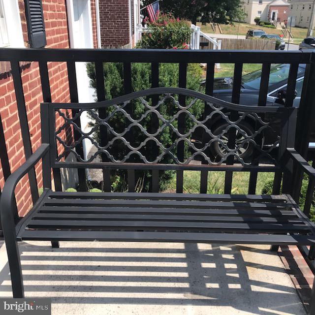 4 Tanglewood Road Baltimore, MD 21228 - Photo 30 of 35 PRETTY FRONTPORCH BENCH MATCHES THE NEW RAILING!