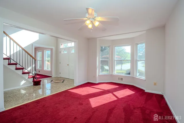 a view of an empty room with window