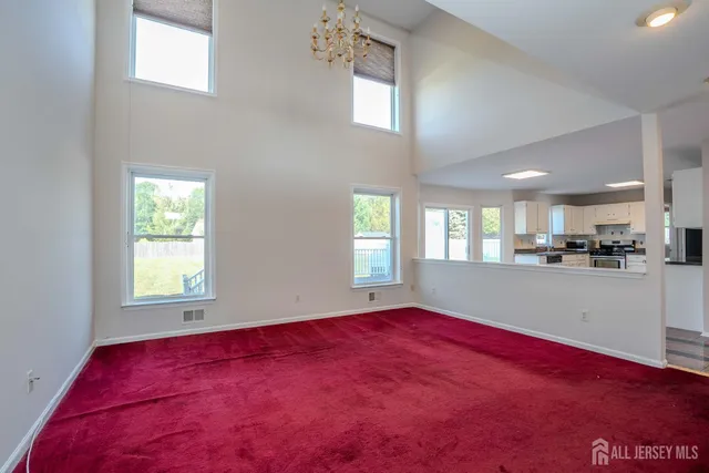 a view of staircase with wooden floor