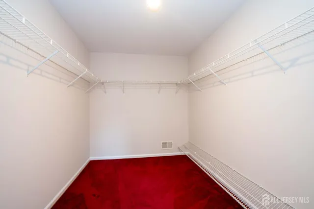 an aerial view of a house with outdoor space