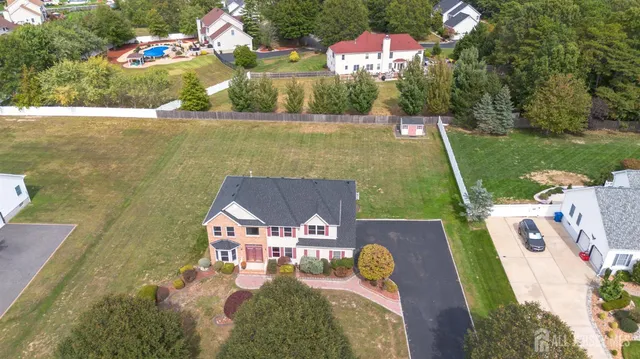 a aerial view of a house with garden