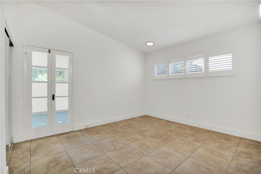 20300 Sherman Way Winnetka, CA 91306 - Photo 20 of 33 a view of an empty room with a window