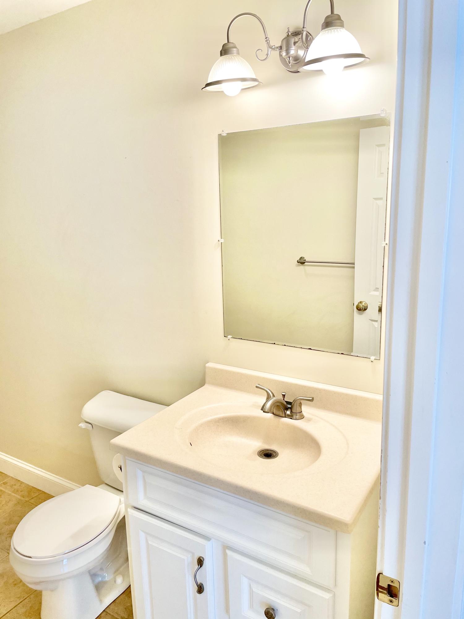 245 Spring Street, Unit 3 Westbrook, ME 04092 - Photo 12 of 28 Half Bath Laundry 1