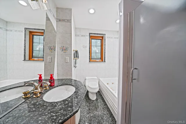 a view of a livingroom with furniture and staircase