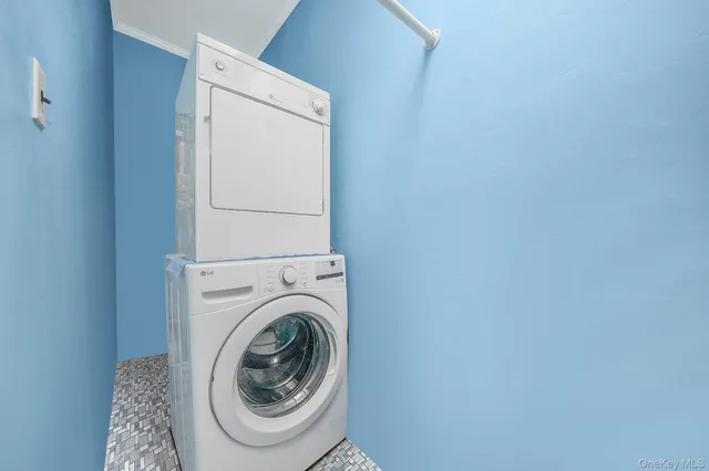 a view of an empty room with stairs