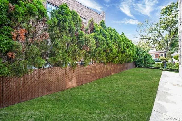 a view of a outdoor space with furniture and umbrella