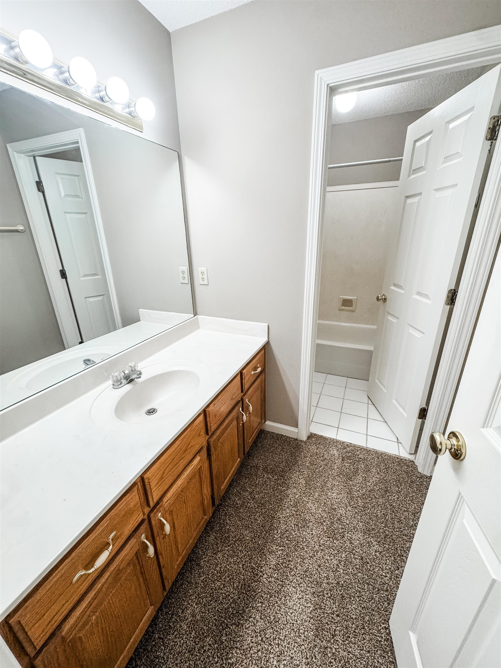 624 Landing Party Lane Collierville, TN 38017 - Photo 11 of 14 a spacious bathroom with a double vanity sink a mirror and a shower