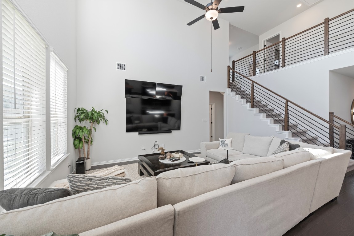 261 Fawn Riv Run Kyle, TX 78640 - Photo 11 of 40 a living room with furniture and a flat screen tv