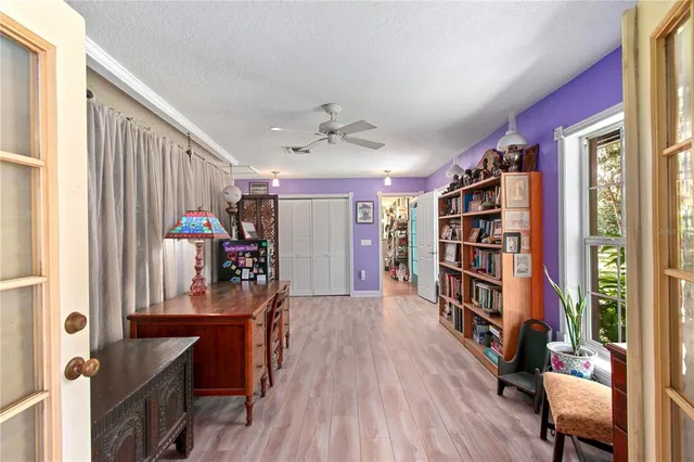 a bed room with a bed and a dresser