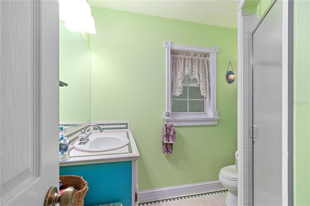 17840 Northeast 45th Avenue Road Citra, FL 32113 - Photo 20 of 62 a bathroom with a sink toilet and window