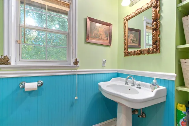 a view of a wooden house with a yard