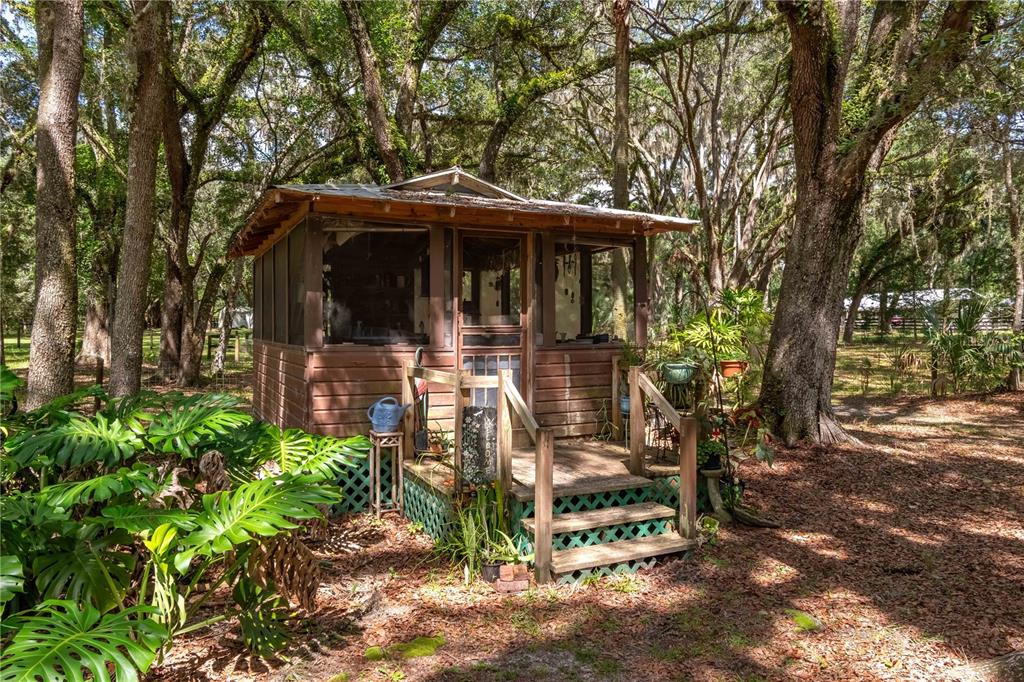 17840 Northeast 45th Avenue Road Citra, FL 32113 - Photo 38 of 62 a view of a wooden house with a yard