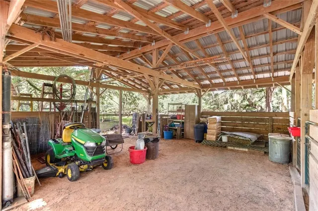 a view of a yard with a tree
