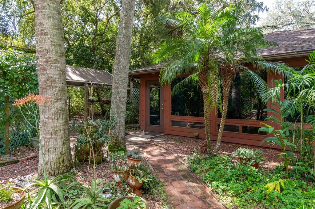 17840 Northeast 45th Avenue Road Citra, FL 32113 - Photo 5 of 62 a view of a house with a tree in front