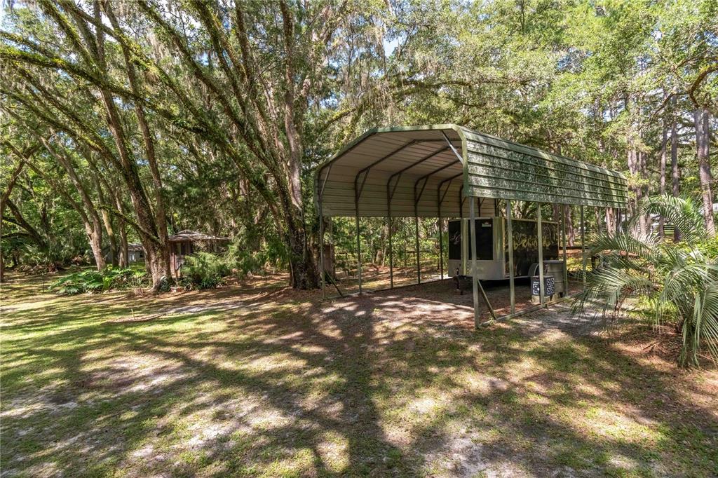 17840 Northeast 45th Avenue Road Citra, FL 32113 - Photo 53 of 62 a view of a house with a yard