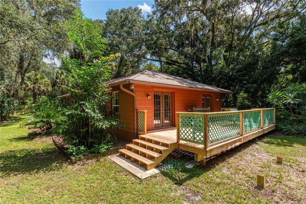 17840 Northeast 45th Avenue Road Citra, FL 32113 - Photo 8 of 62 a front view of a house with a yard