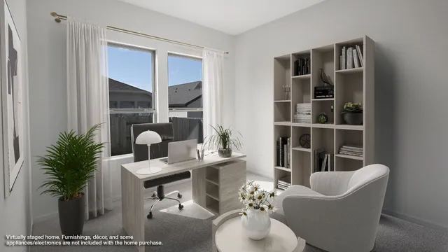 a living room with furniture potted plant and a table