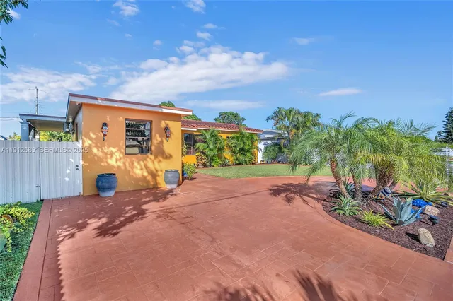 a view of a street with a garage