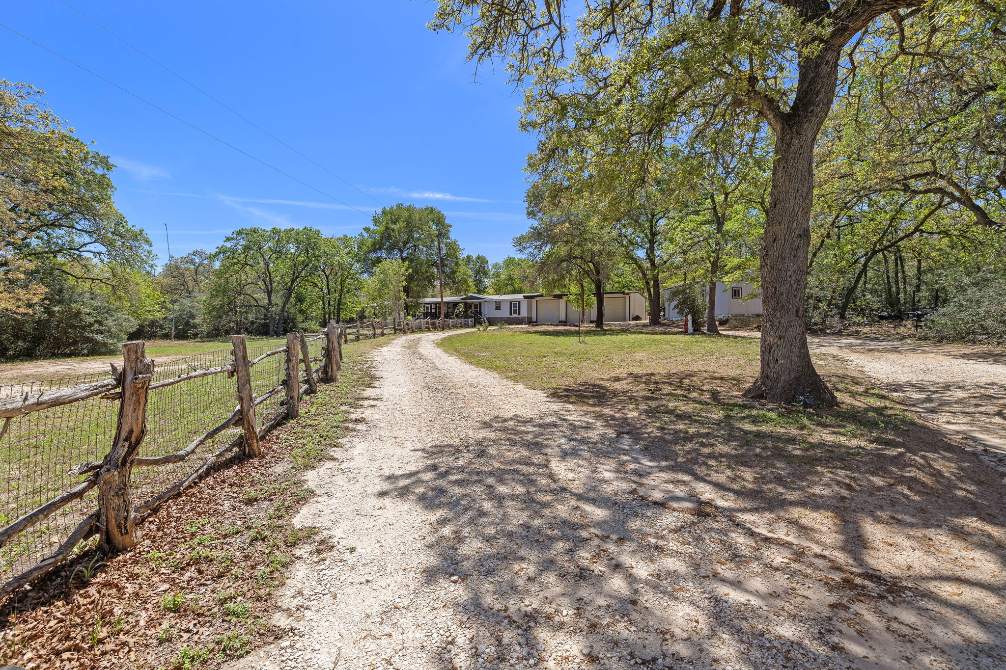 541 Hidden Oaks Drive Elgin, TX 78621 - Photo 2 of 40 Lovely view from road