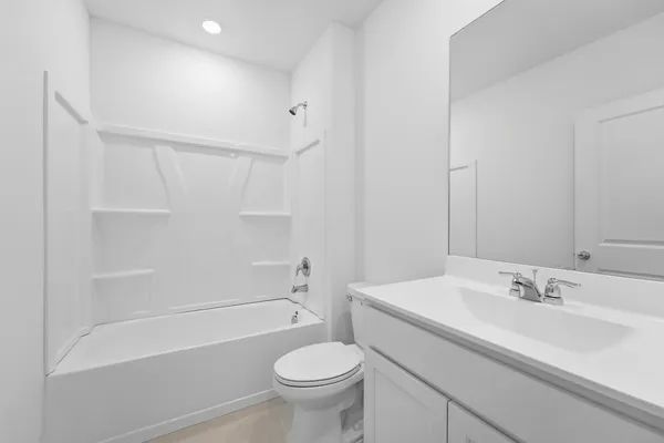 a bathroom with a sink toilet and bathtub