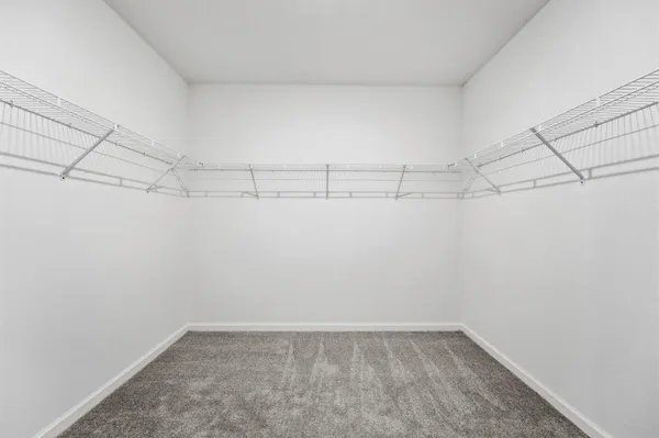 a view of a room with racks on the wall