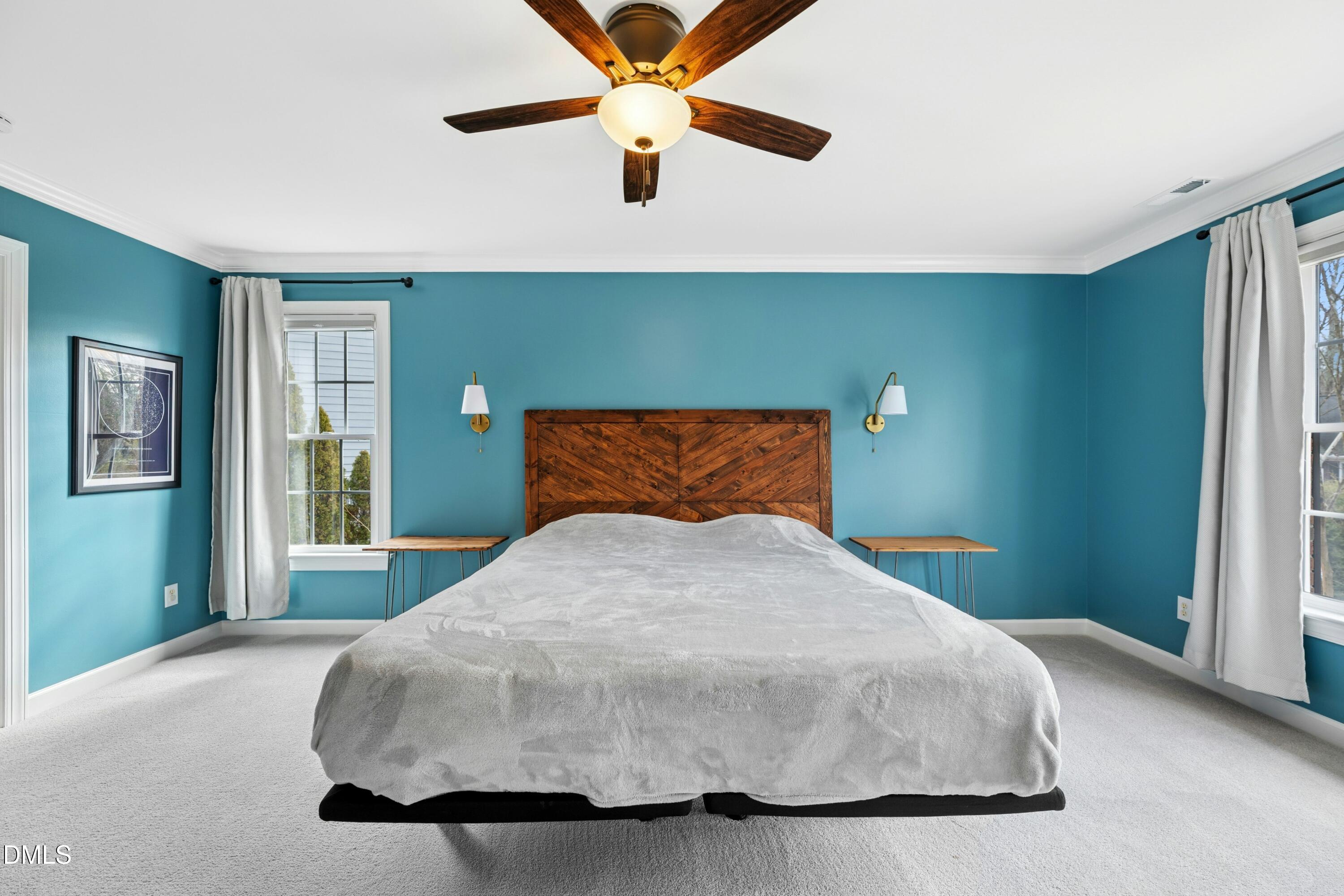 117 Barnes Spring Court Cary, NC 27519 - Photo 17 of 38 a bedroom with a bed and window