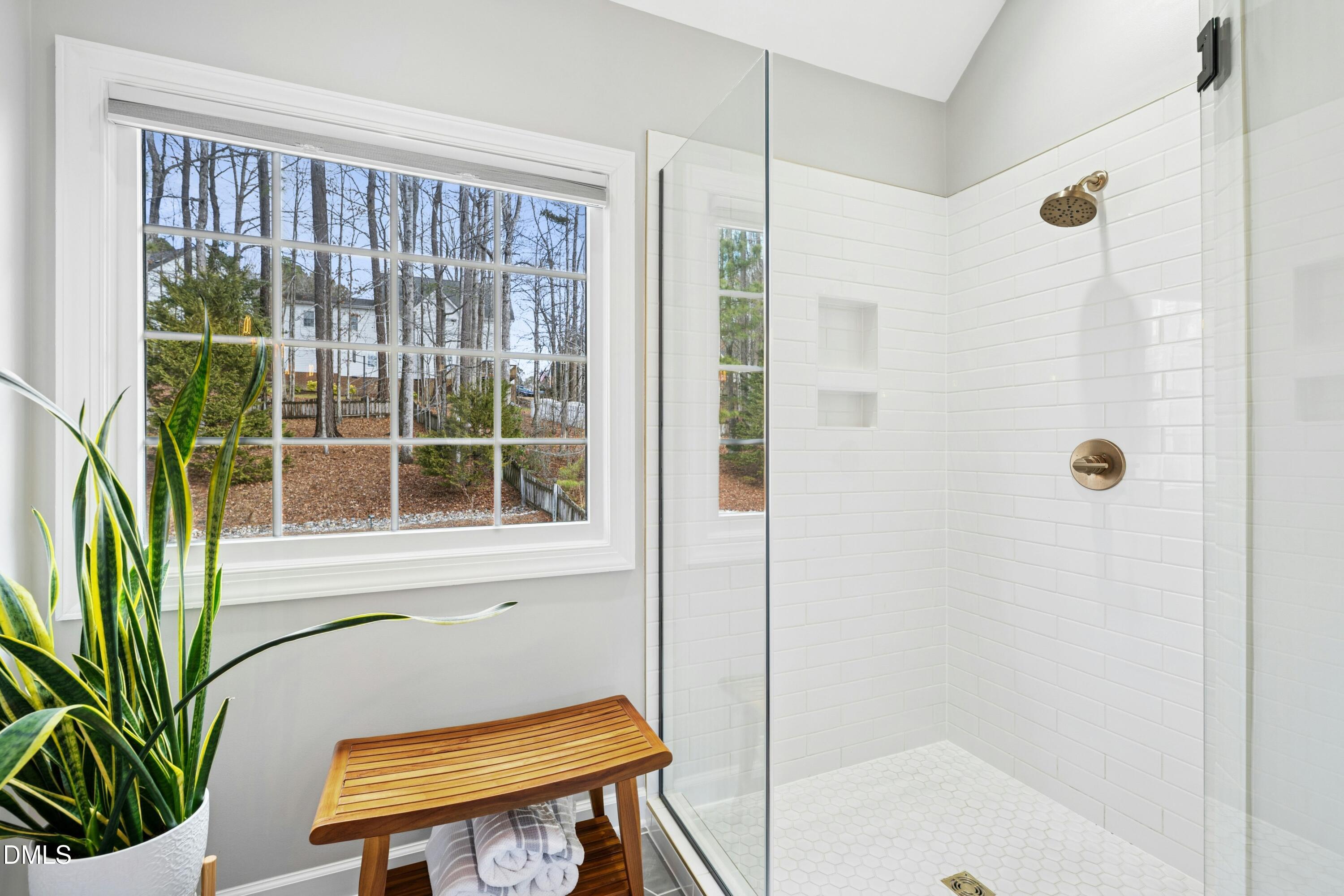 117 Barnes Spring Court Cary, NC 27519 - Photo 21 of 38 a bathroom with a shower curtain and a sink