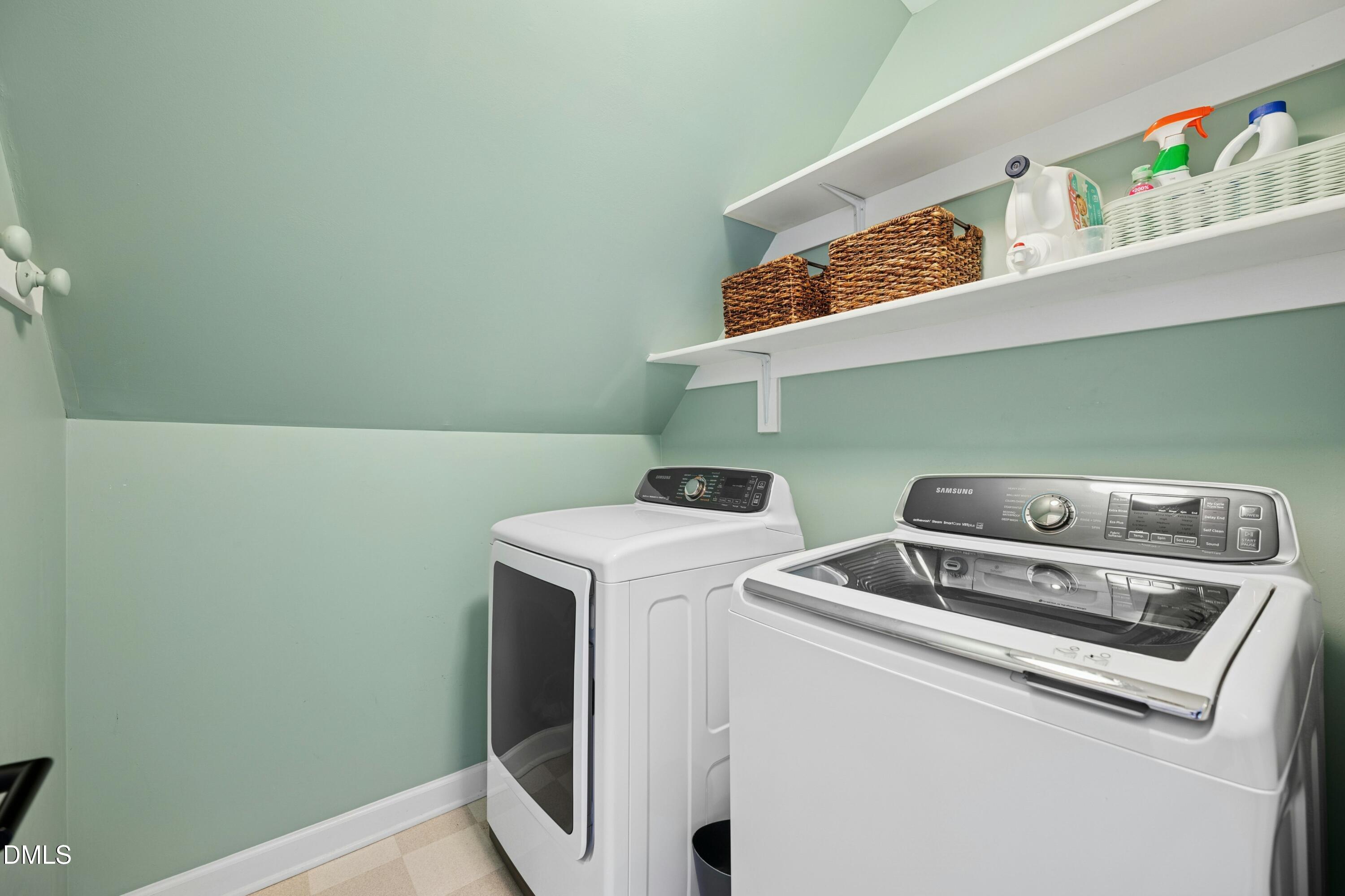 117 Barnes Spring Court Cary, NC 27519 - Photo 28 of 38 a utility room with dryer and washer