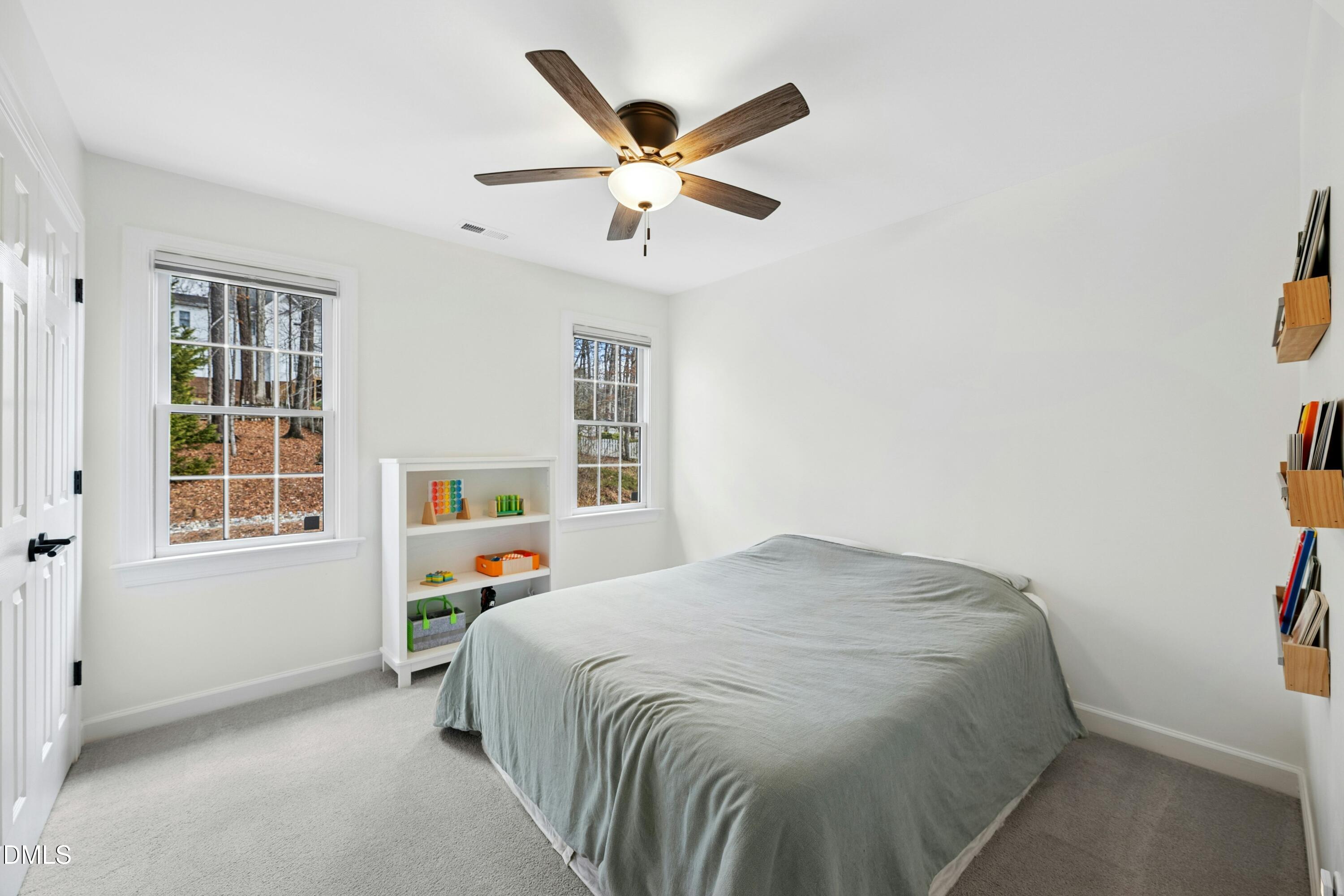 117 Barnes Spring Court Cary, NC 27519 - Photo 31 of 38 a bedroom with a bed and window