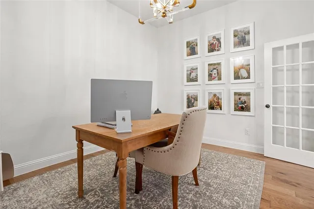 a view of a workspace with furniture