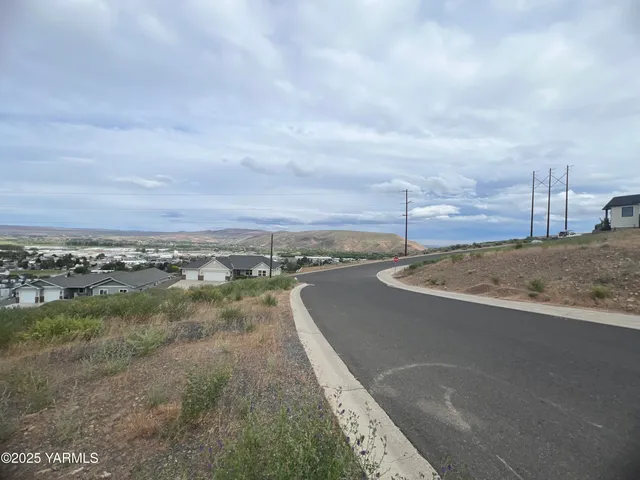 a view of a lake with mountains in the background