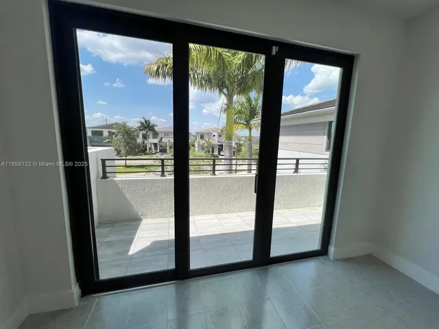 a view of outdoor space with a kitchen