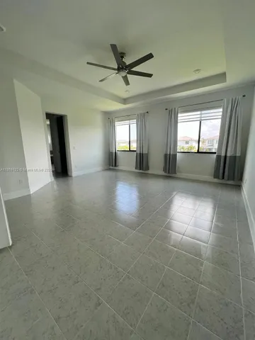a bathroom with a sink a bathtub and window