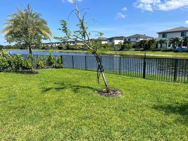 a view of a balcony with chair and table