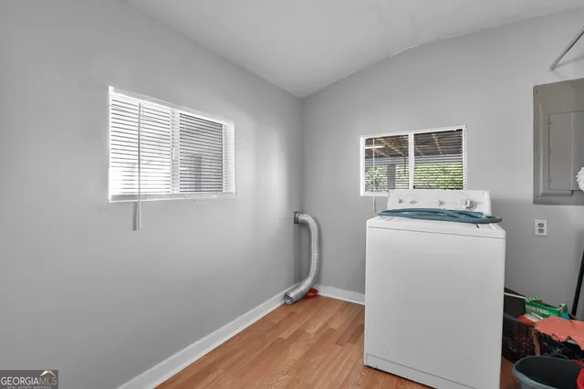 a view of a room with washer and dryer