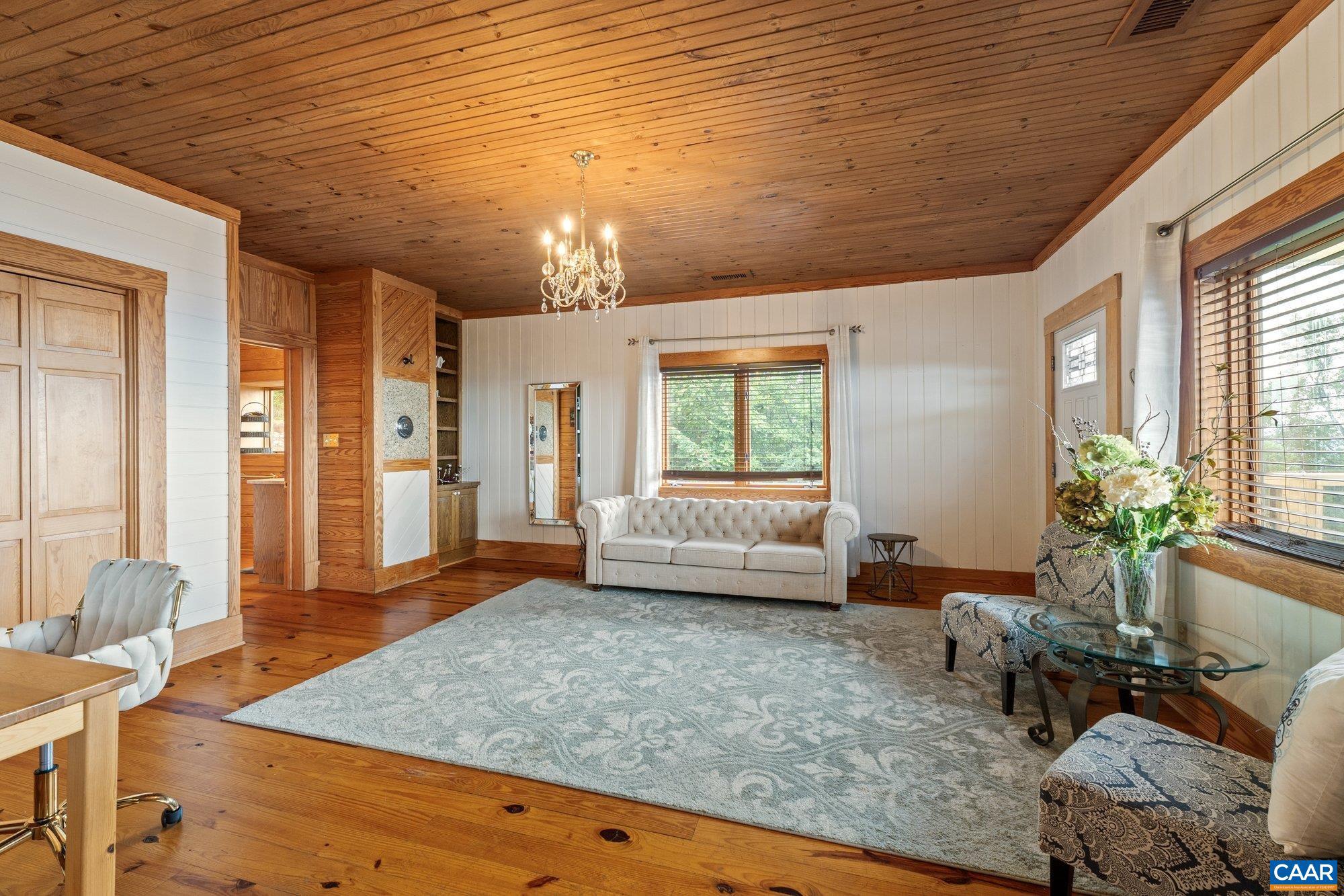 1376 A Wyatt Mountain Road Dyke, VA 22935 - Photo 38 of 58 a living room with furniture and wooden floor