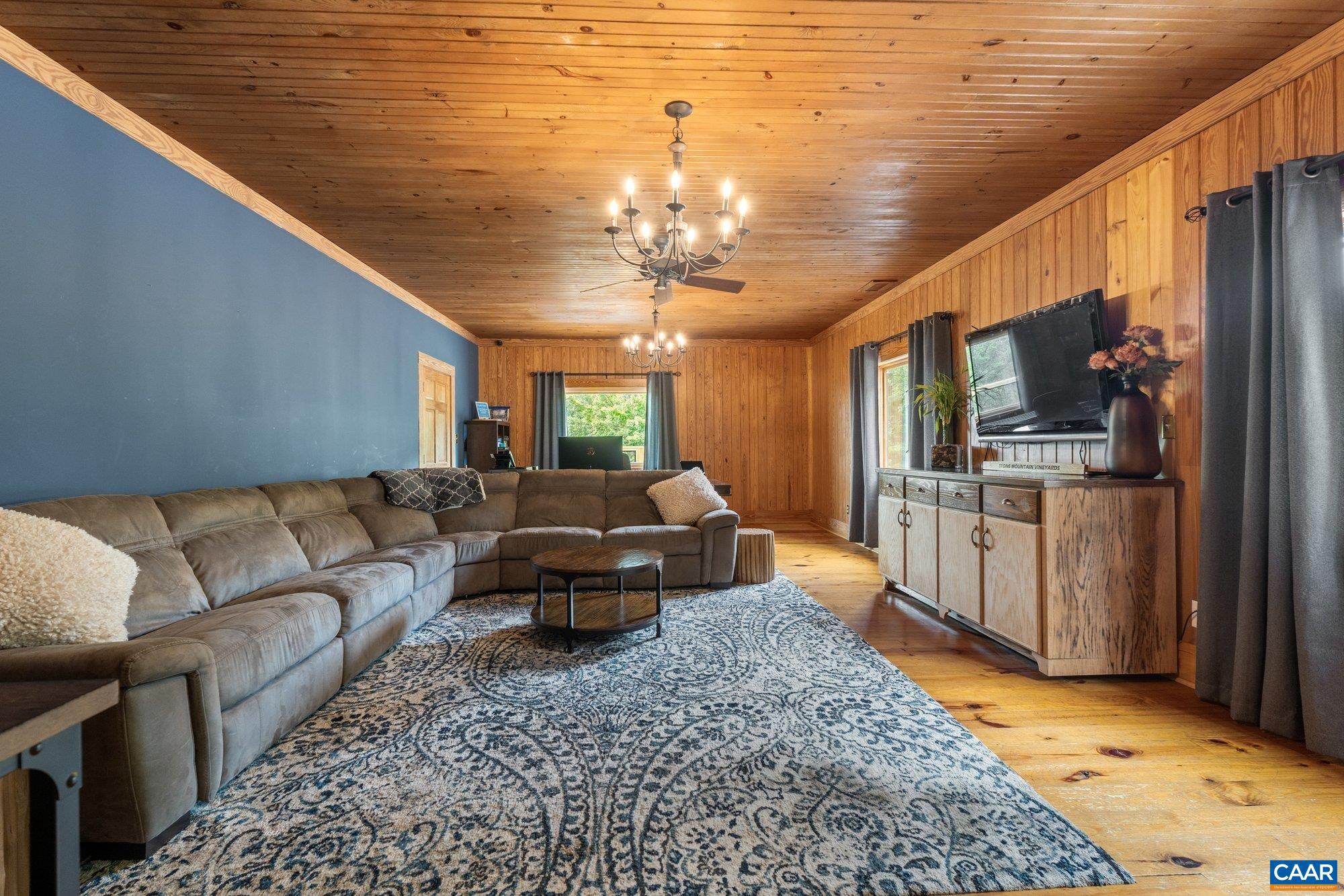 1376 A Wyatt Mountain Road Dyke, VA 22935 - Photo 41 of 58 a living room with furniture and a kitchen