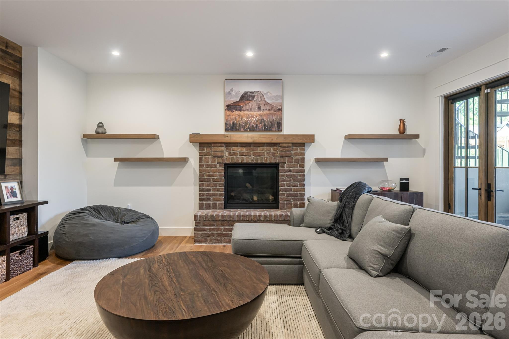 25 Rantis Lane Black Mountain, NC 28711 - Photo 47 of 48 a living room with furniture and a fireplace