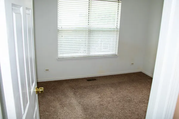 an empty room with a window