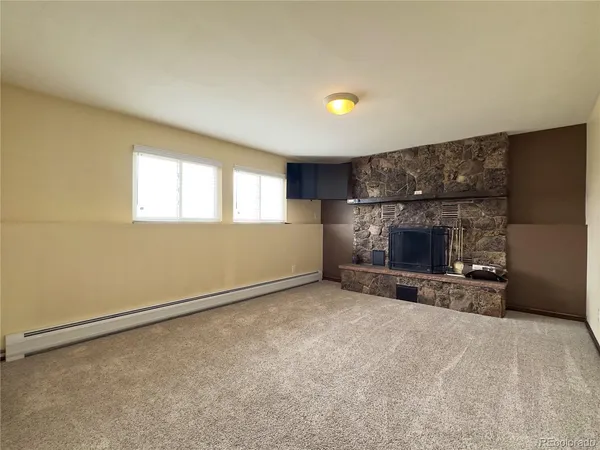 an empty room with windows