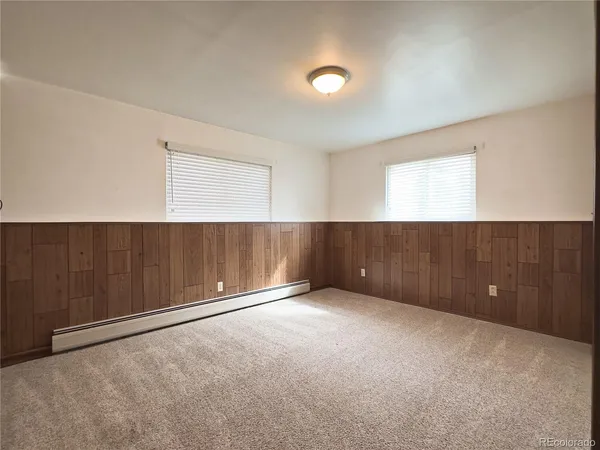 a view of a porch with wooden floor