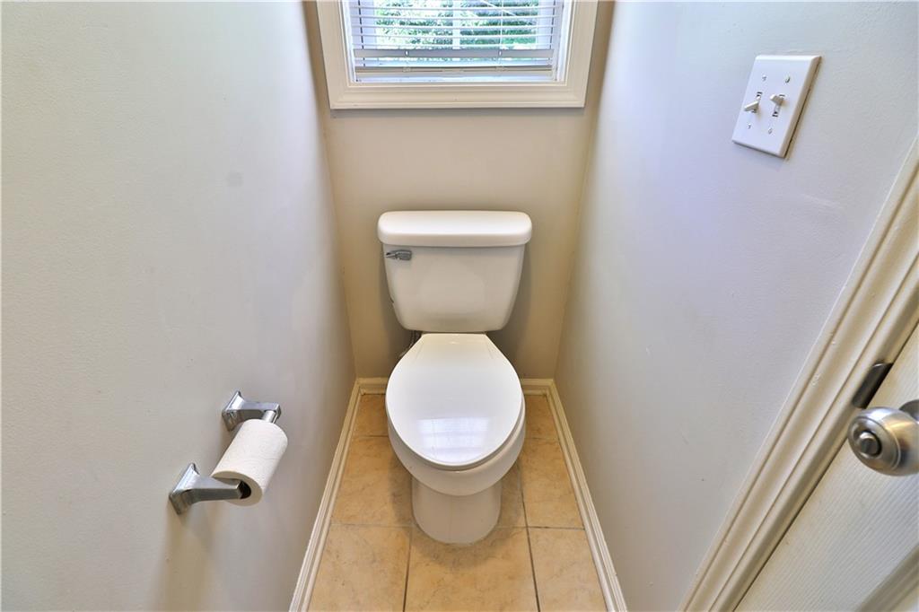 353 Fall View Court Winder, GA 30680 - Photo 41 of 61 a bathroom with a toilet and a sink
