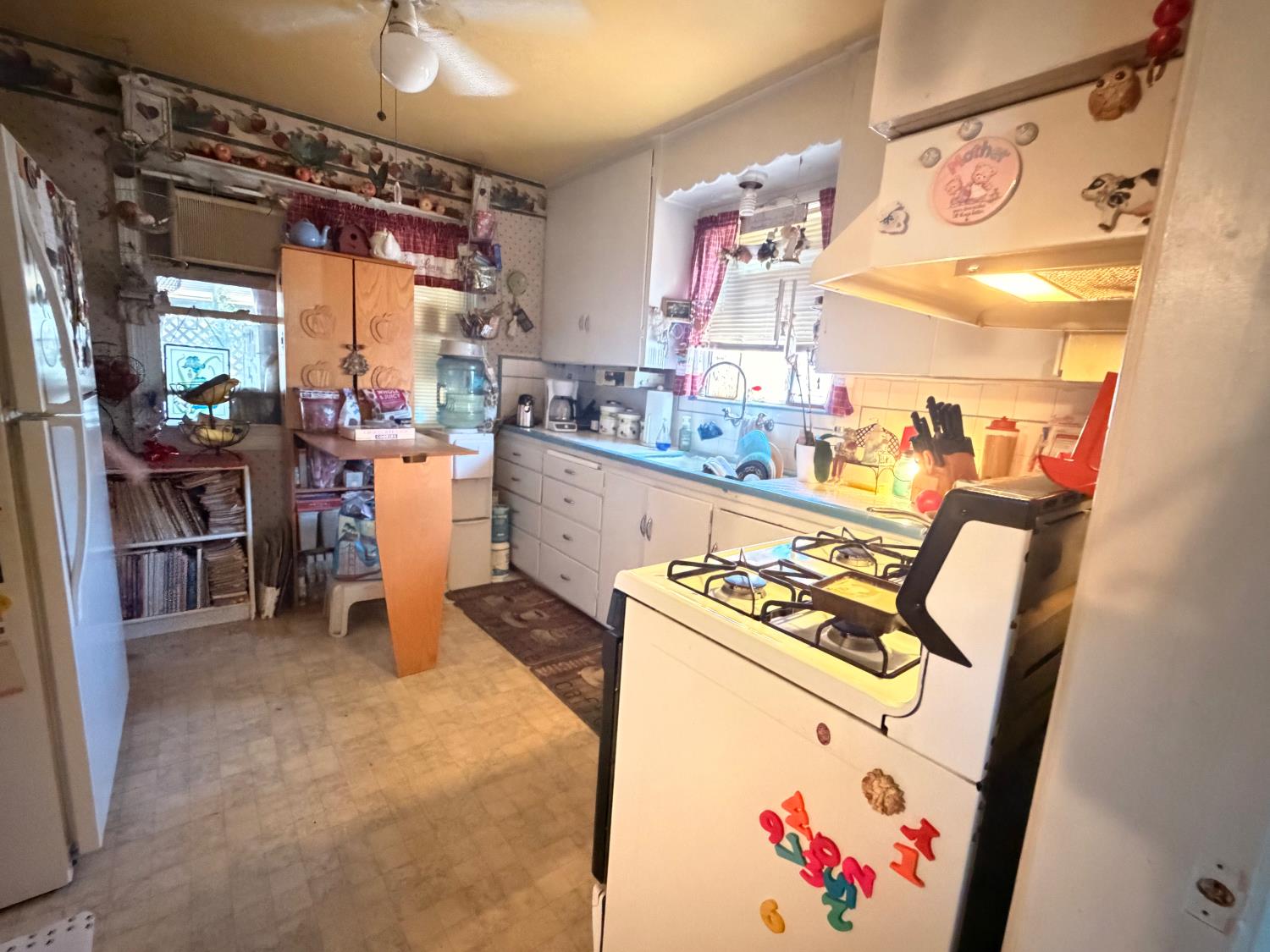 340 Bothun Road Turlock, CA 95380 - Photo 13 of 38 a room with storage and utility