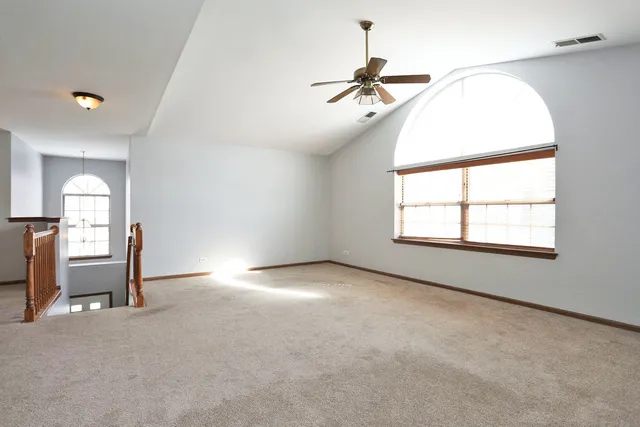 a view of n empty room and window