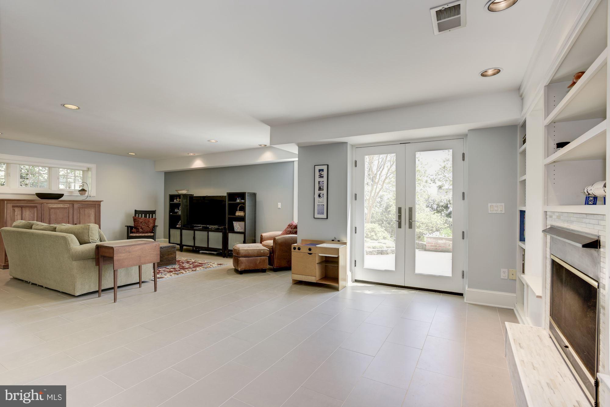 1507 Stonewall Road Alexandria, VA 22301 - Photo 21 of 29 Large recreation room with terrace access.