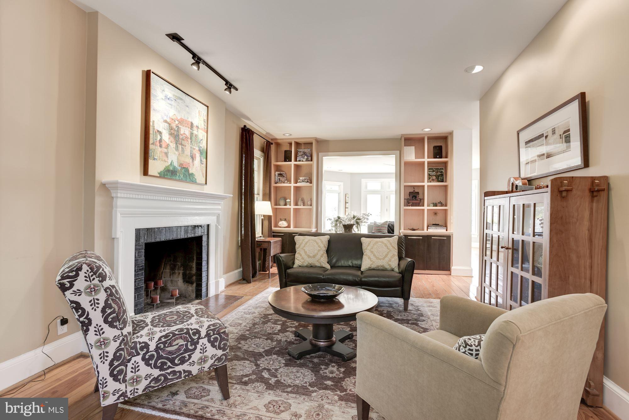 1507 Stonewall Road Alexandria, VA 22301 - Photo 4 of 29 Living room boasts custom maple built-ins.