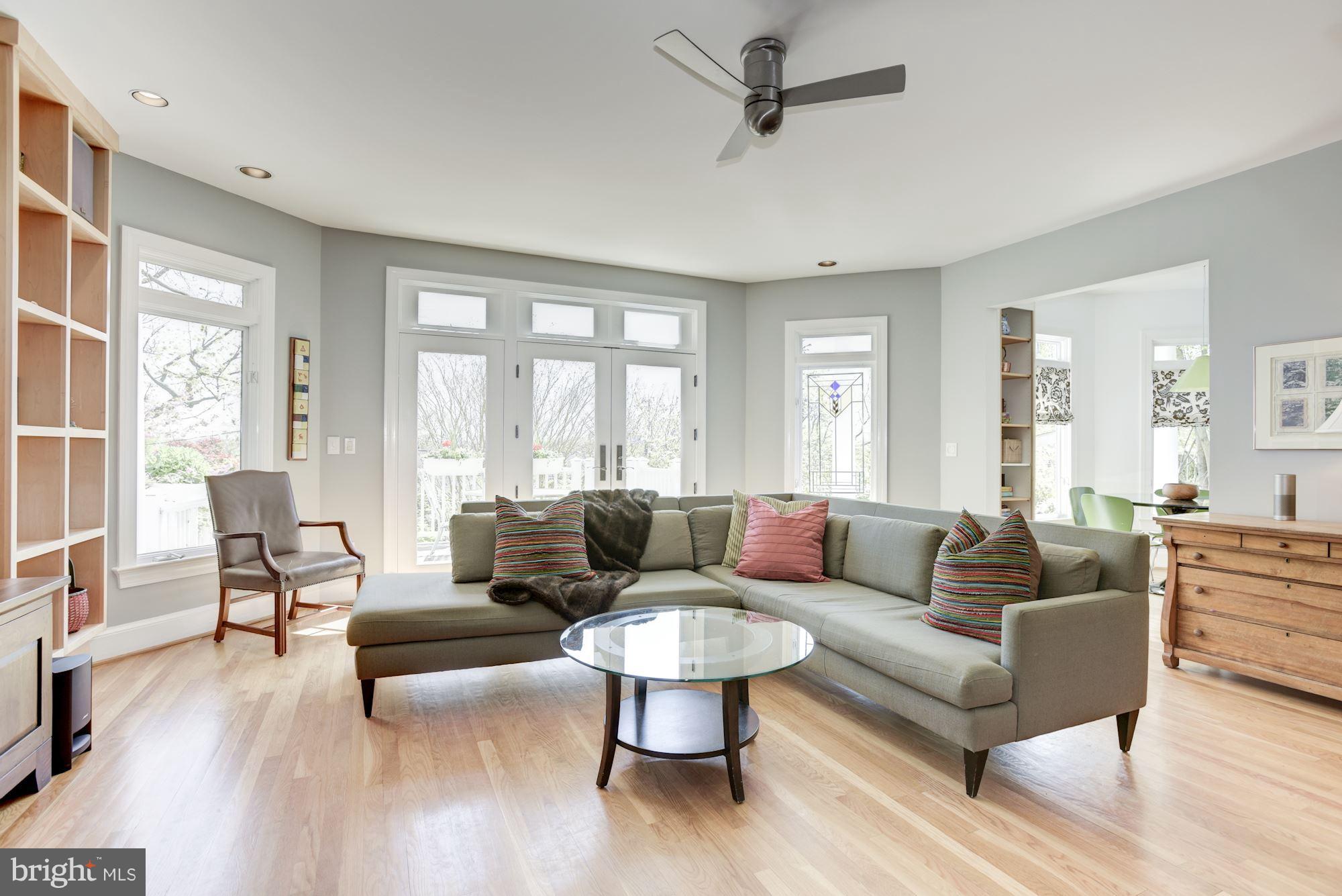 1507 Stonewall Road Alexandria, VA 22301 - Photo 6 of 29 Light filled family room overlooks deck and garden