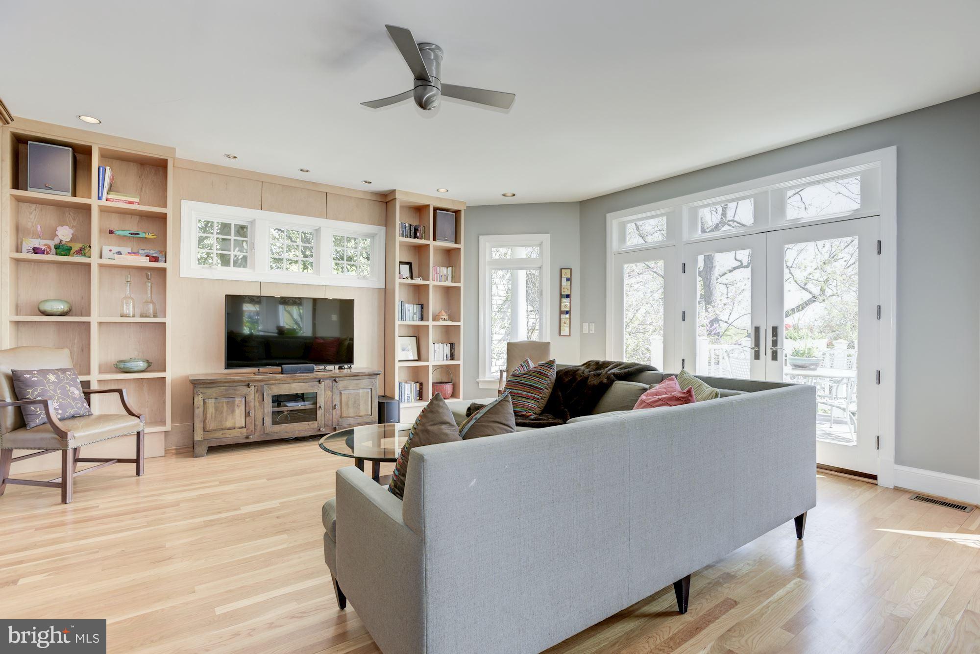 1507 Stonewall Road Alexandria, VA 22301 - Photo 7 of 29 Custom maple built-ins frame medial space.